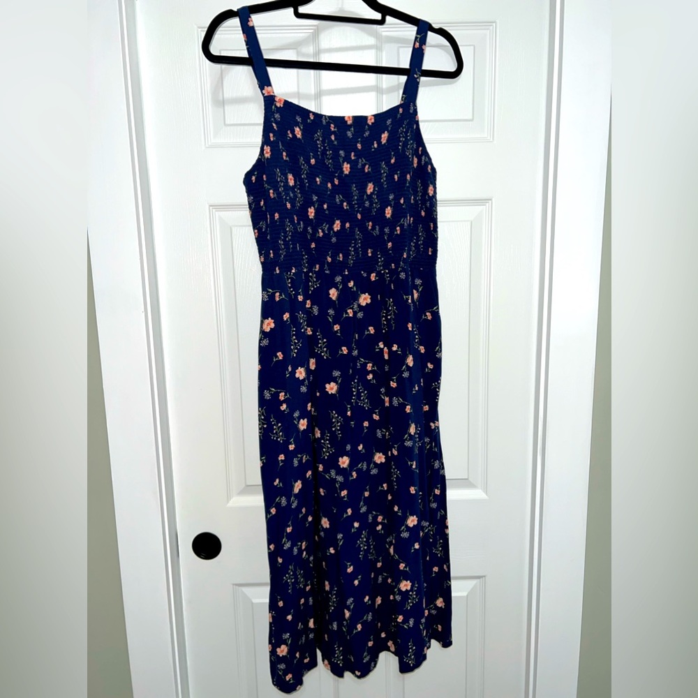 Beautiful blue dress with flowers on it